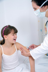 nurce giving vaccination injection to little girl patient
