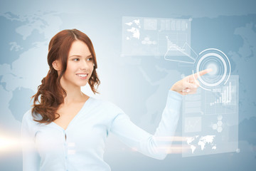 businesswoman touching virtual screen