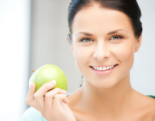 beautiful woman in the with an apple