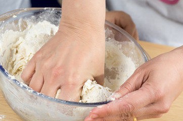 Fototapeta premium mother and son making a pizza 2
