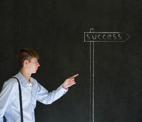 Business man and chalk success street sign