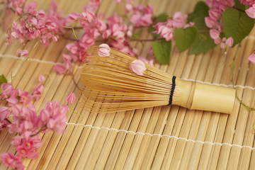 Close up of Japanese tea whisk.