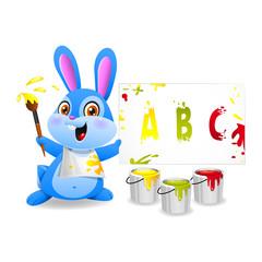 Cheerful rabbit draws on paper
