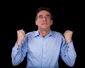 Fototapeta premium Frustrated Business Man Shaking Fists in Anger