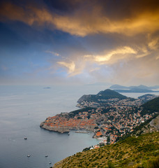 sea town under sunset sky