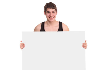 Happy man holding an empty billboard. Man looking at the camera.