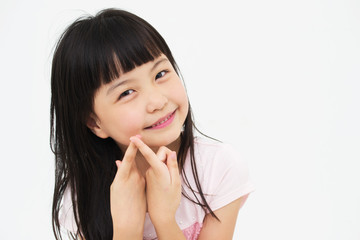 Happy little girl on white background 