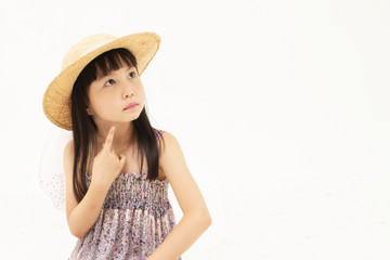 Beautiful asian little girl thinking