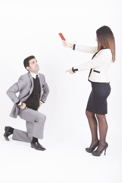 business woman showing executive red card