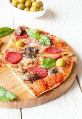 appetizing pizza cut into slices
