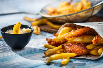 Closeup of homemade Fish & Chips and sauce