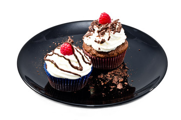 choclot muffins with raspberries and whipped cream