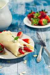 Closeup of pancakes with strawberries