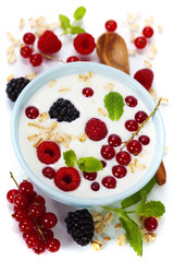 healthy breakfast: bowl of cerial with yogurt or milk