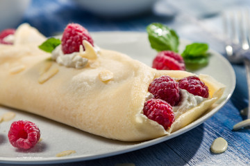 Closeup of fresh raspberry pancakes