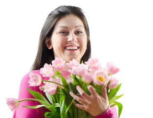 Beautiful happy woman with tulips
