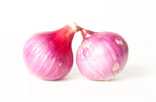 Raw red onion isolated on white background with clipping path