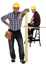 Two male carpenters