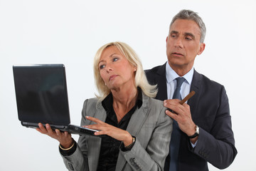 Man putting the moves on his co-worker