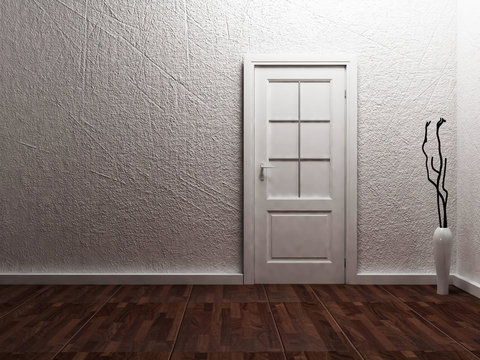 White  door in the empty room