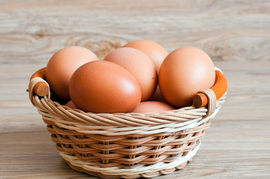 Brown eggs in a wicker basket
