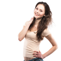 Fototapeta premium Portrait of a happy young girl smiling