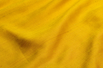 drape of yellow silk