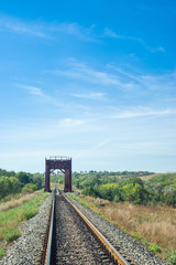 Fototapeta na wymiar Summer landscape with small railroad bridge in Ukraine.