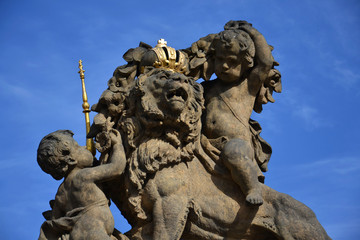 Statue of lion in front of the Prague Castle