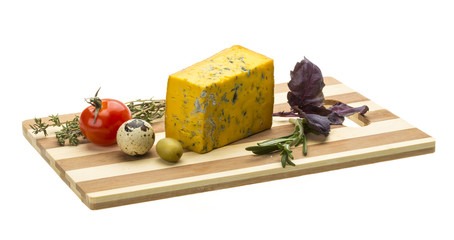 Yellow cheese with blue mold