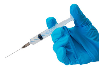 hand in blue glove with syringe