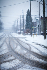 Snow-covered road, the marks of wheels.
