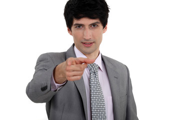 Businessman pointing his finger