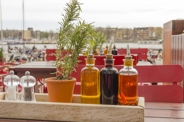 balsamic vinegar bottles and condiments on the table in an open