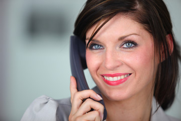 Friendly brunette receptionist
