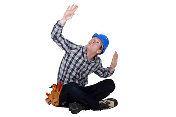 Laborer gesturing, studio shot