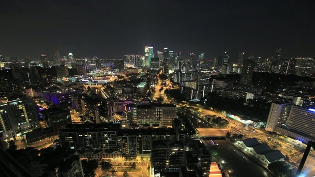 Singapore Skyline and Traffic Light Trails at Night Timelapse
