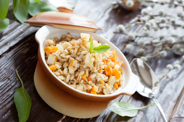 nutritious porridge from barley grains with vegetables