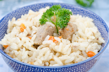 two bowls Uzbek pilaf closeup horizontal
