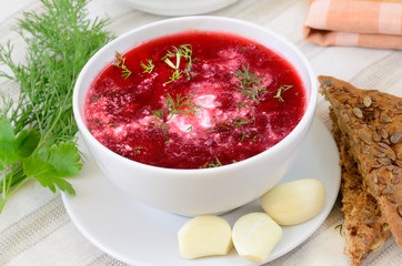 Red borscht with sour cream and dill