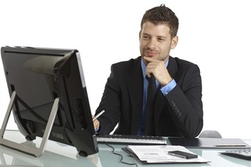 Young businessman working with computer