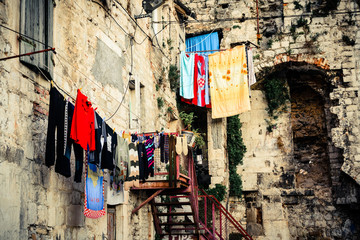 Scenery in old part of town showing laundry day