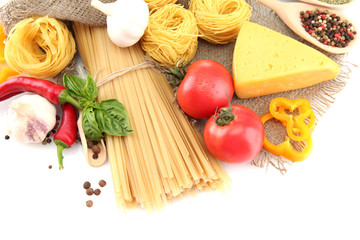 Pasta spaghetti, vegetables and spices, isolated on white
