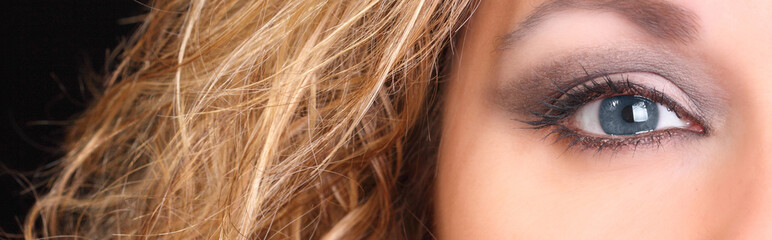 picture of a beautiful woman with a blue eye