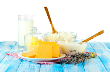 Glass of milk and cheese  on bright background