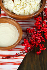Dairy products on wooden table close-up