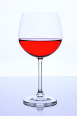 Red wine glass isolated on white