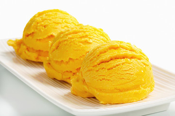 Scoop of yellow ice cream