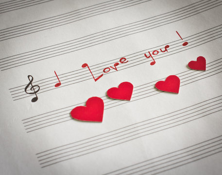 Words "I love you !" in shape of music notes