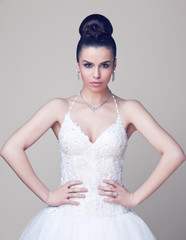 Young and beautiful bride standing in studio - 50855641